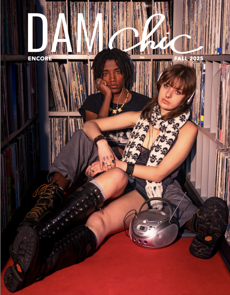 Magazine cover with two people sitting near shelves of records