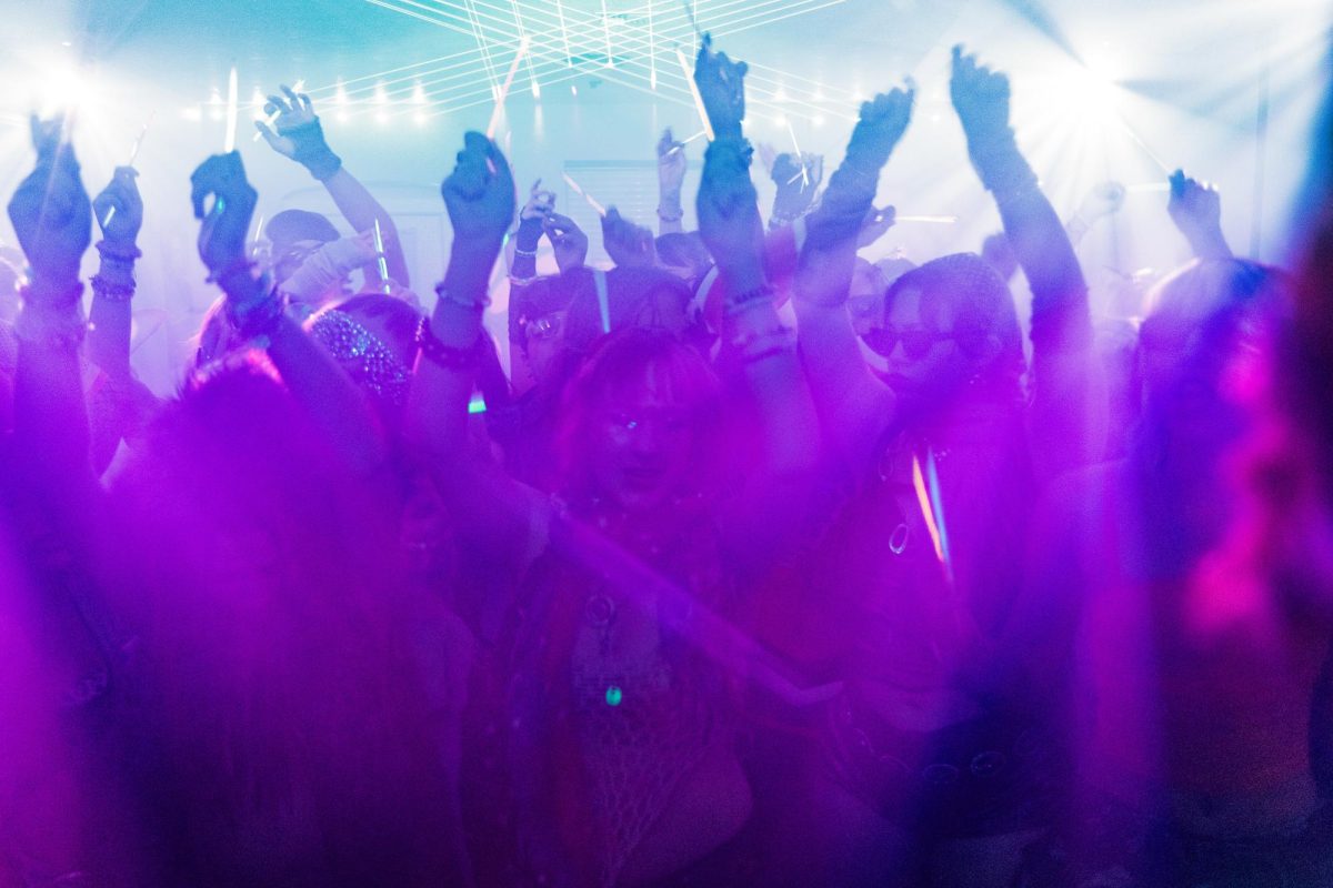 People dance at a nightclub